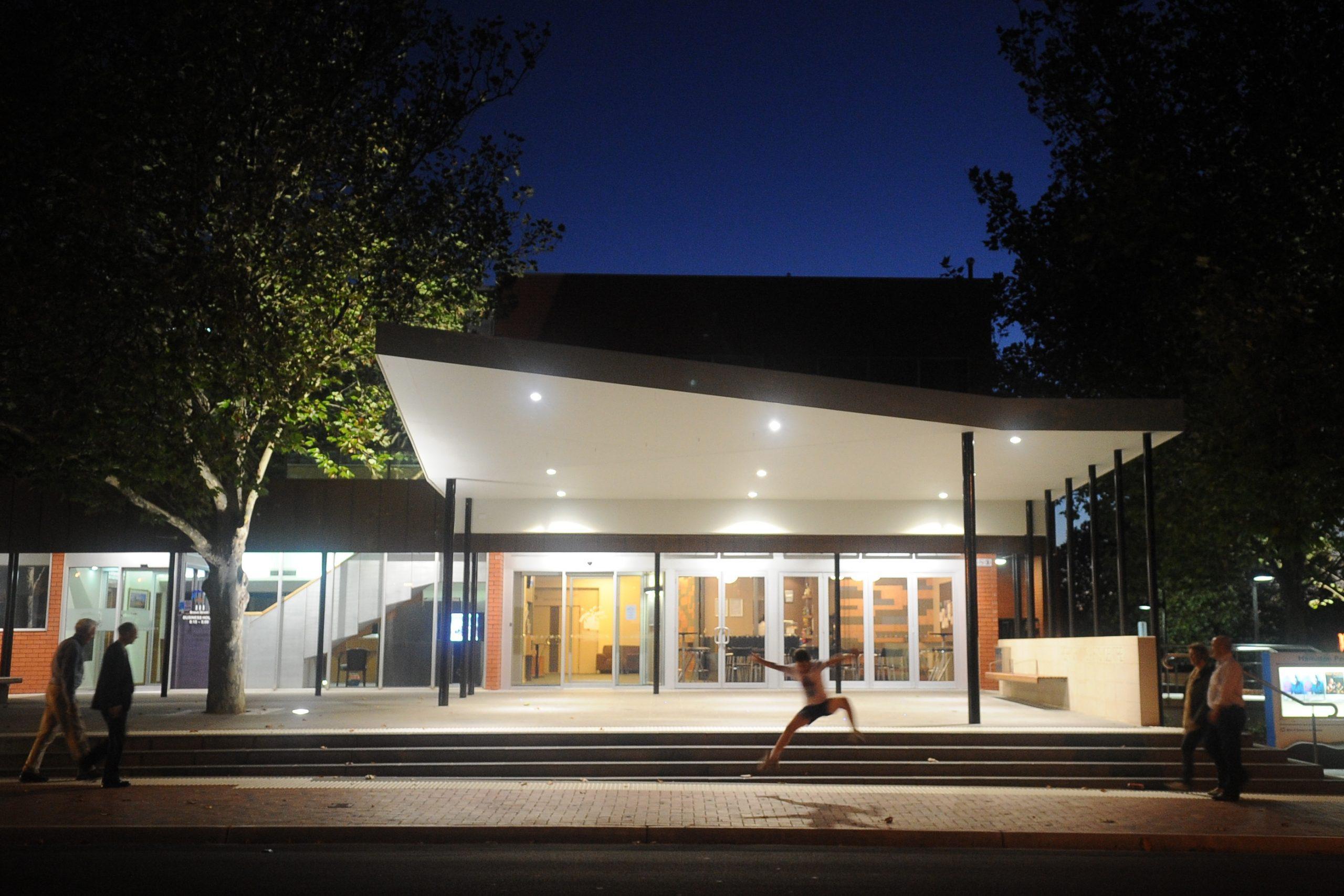 HPAC facade at twilight with dancing figure - square